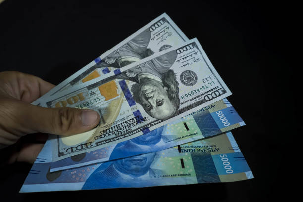 Rupiah Melemah ke Rp16.271, BI Turunkan Suku Bunga ke 5%